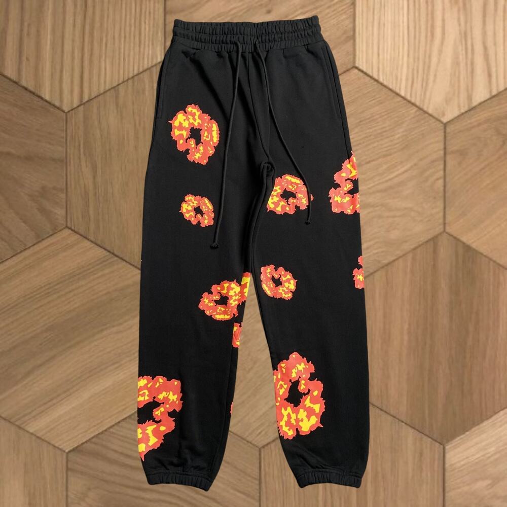 DENIM TEARS Pants Black And Orange